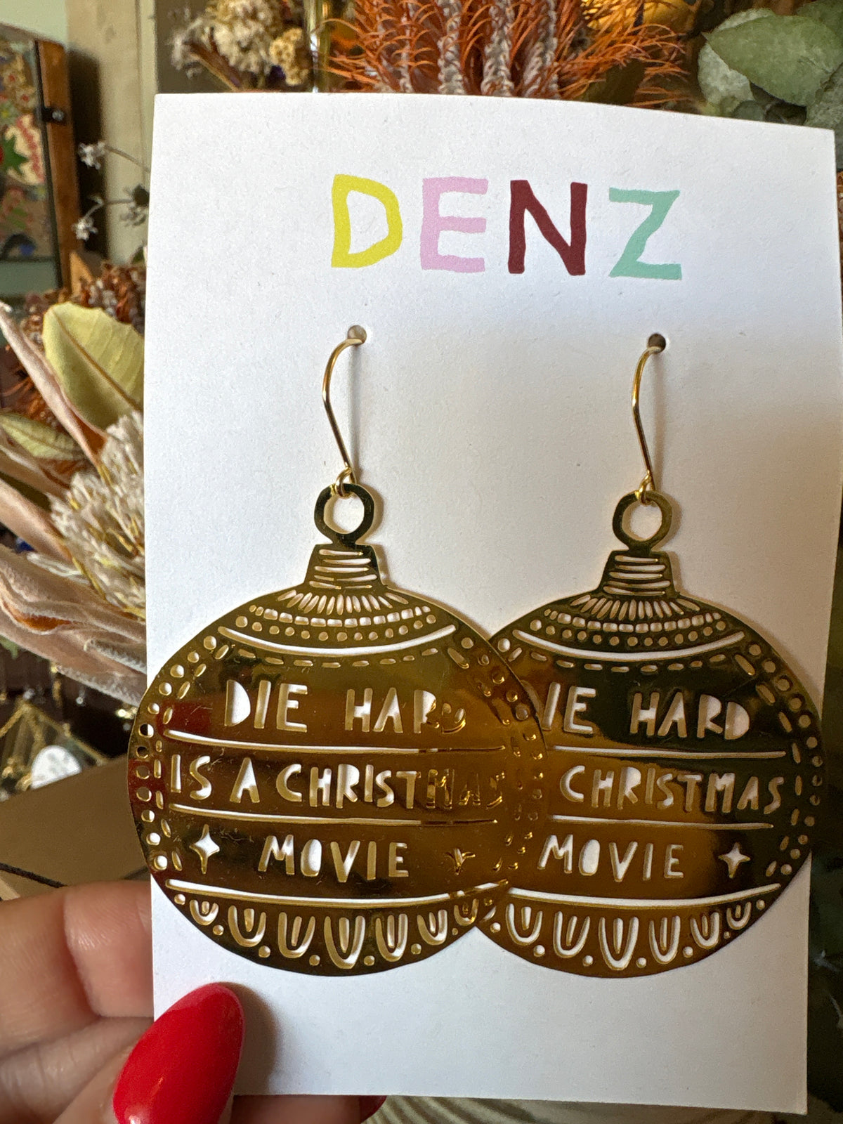 Denz earrings - Die Hard is a Christmas Movie (gold bauble)
